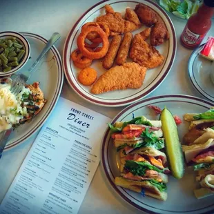 three plates of food on a table