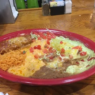 Numero Tres--- seafood enchilada, chicken tomale and cream cheese enchilada.