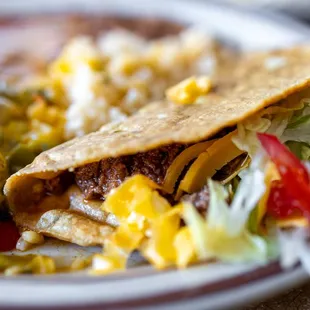 Mexican Combo ($11) w/ Christmas enchiladas, rice, beans and a crunchy taco