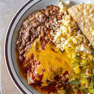 Mexican Combo ($11) w/ Christmas enchiladas, rice, beans and a crunchy taco