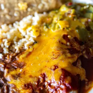 Mexican Combo ($11) w/ Christmas enchiladas, rice, beans and a crunchy taco