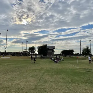 The brick pavilion has restrooms and a snack shop. To the left is a giant playground.