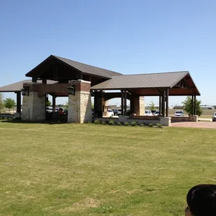 The pavilion includes 4 picnic tables and a huge shaded area for playing games or dancing. ;)
