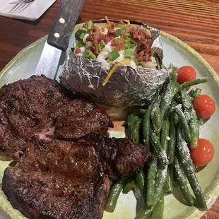 T-bone steak. Yummy   We love this place. The food is excellent, and the service is great.