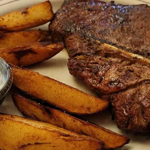 Cowboy Junior- 22 Oz. Porterhouse, flavorful and juicy. With side of Buckskins.