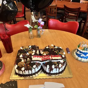 a birthday cake with chocolate and marshmallows