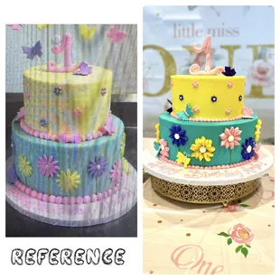 a three tiered cake and a cake topper