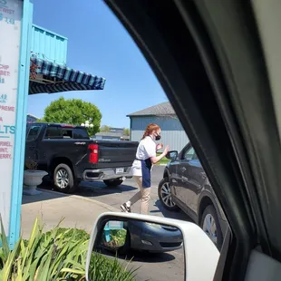 Drive-thru line moves quick because they bring orders to you!
