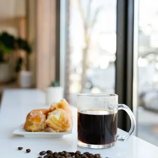 a cup of coffee and a donut