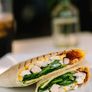 a chicken and spinach wrap