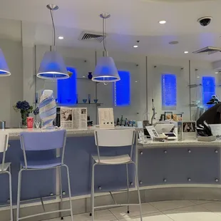 a woman sitting at a counter