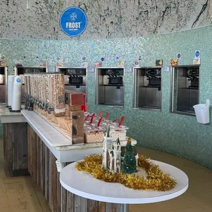 a counter with a variety of desserts on it