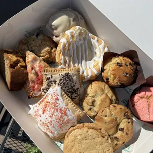 Scones, cheese danish, pop tarts, chunky cookies, muffins, oatmeal cookie sammich