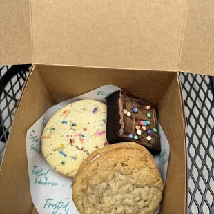 Cosmic brownie, oatmeal and sugar cookie .