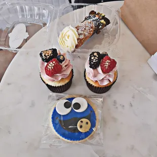Cannoli, chantilly raspberry cupcakes, cookie monster sugar cookie