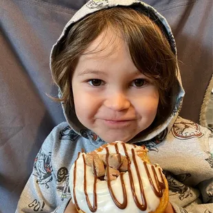 This little guys first Frosted Donut experience.  He loved it !