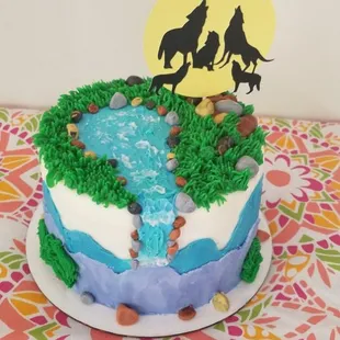 a cake decorated with horses