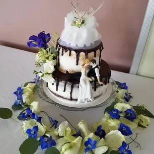 Specialty Boston cream semi naked wedding cake with a chocolate gauche drizzle