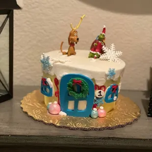Our sons first birthday cake. We went with a grinch theme, and Bethany knocked it out of the park!