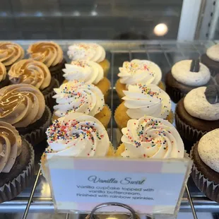 a display of cupcakes