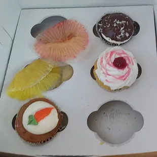 Almond joy, raspberey and carrot cake plus empty wrappers