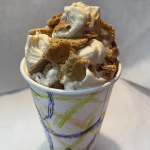 a cup of ice cream with marshmallows