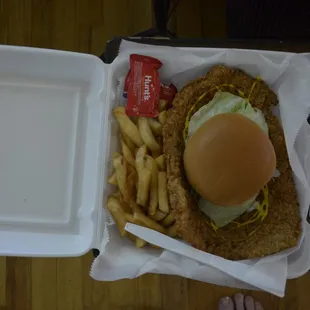 a chicken sandwich and french fries