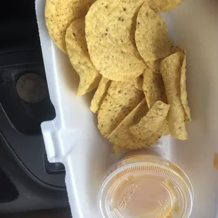 a tray of chips and a drink