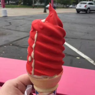 Medium chocolate cone with cherry dip.
