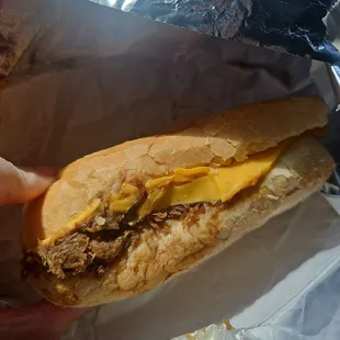 Half roast beef poboy. Added American cheese, pickles, and mustard.