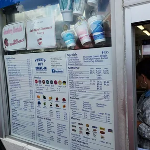 Menu and drink sizes next to drive thru ordering window