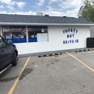 a car parked in front of a building