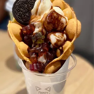 Puffle with oreo, chocolate syrup and gummie bears