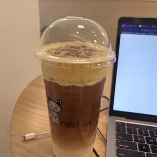 Classic Black Tea w/ oat milk + crème brûlée topping