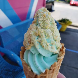 Almond milk pistachio flavor ice cream with crushed almonds