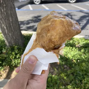 Salted caramel ice cream in a cone.