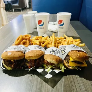 a tray of burgers and fries