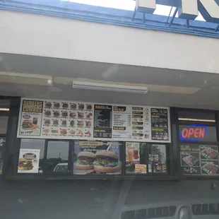 menus on the front of a fast food restaurant