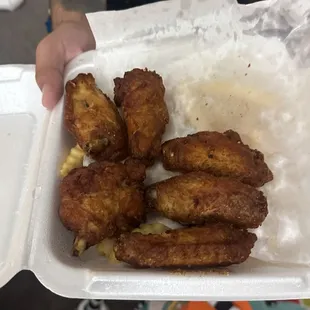 *From a previous visit* we ordered spicy wings and received plain - easy fix but the quality between the two pictures is clear as day