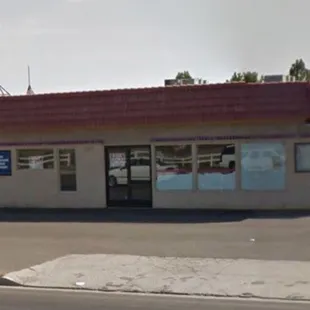 a restaurant with a red roof