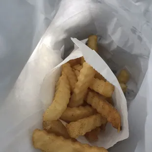 french fries in a paper bag