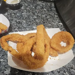 5 onion rings, $7.50