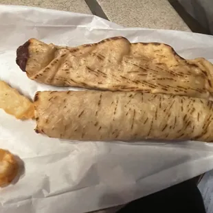 Taquitos, hamburger, old fries.