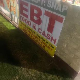 a sign for ebtt food and cash
