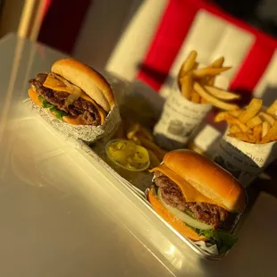 Double cheese burger with jalapeños and grilled onions