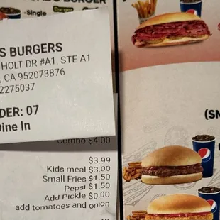 My receipt that shows I was overcharged and menu prices