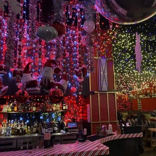 christmas decorations hanging from the ceiling