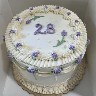 Chocolate cake with raspberry cream filling and vanilla buttercream! All vegan