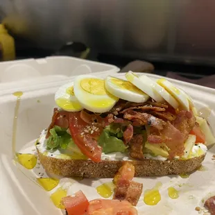 Loaded avocado toast. Bread made fresh weekly from Grateful Bread company, Golden Colorado.