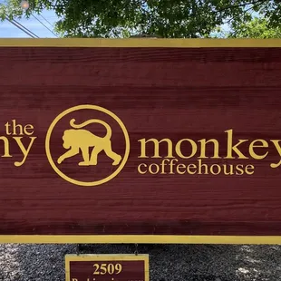 a sign for frothy monkey coffeehouse